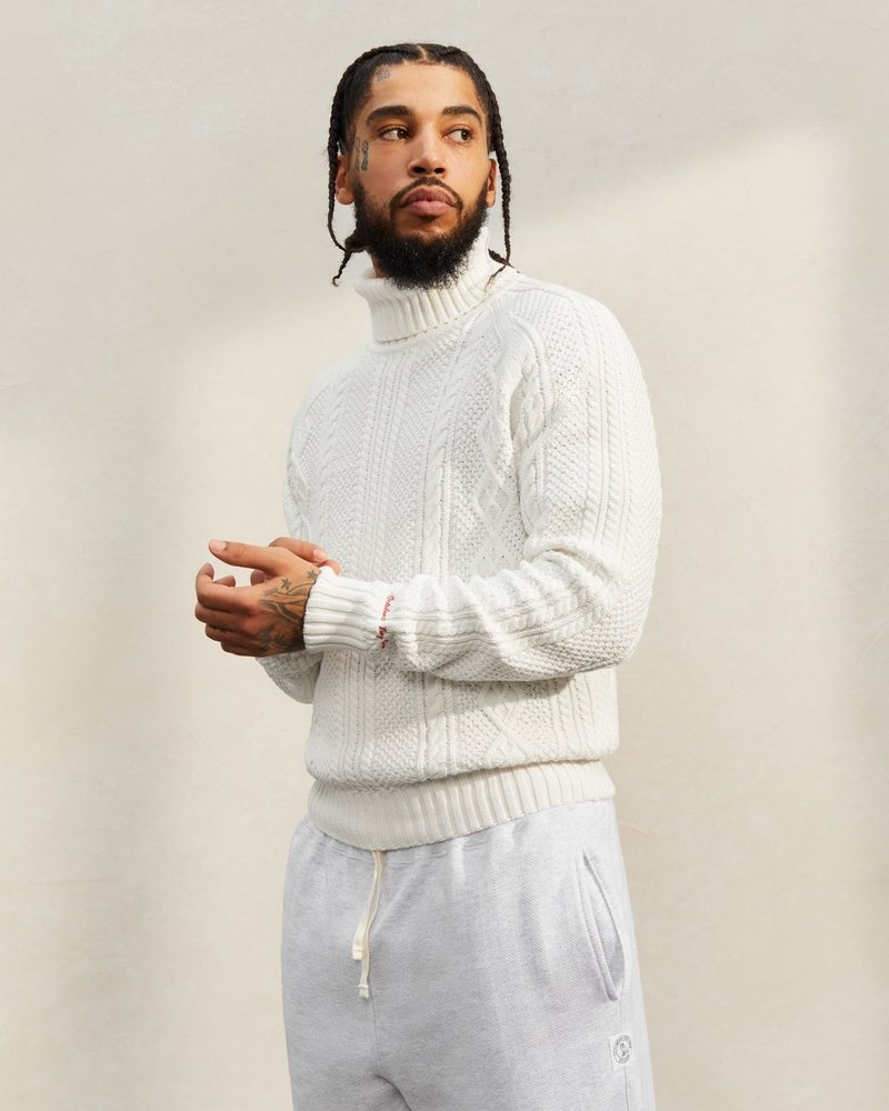 pull à col roulé en maille torsadée ovo blanc modèle « tops octobers very own ».