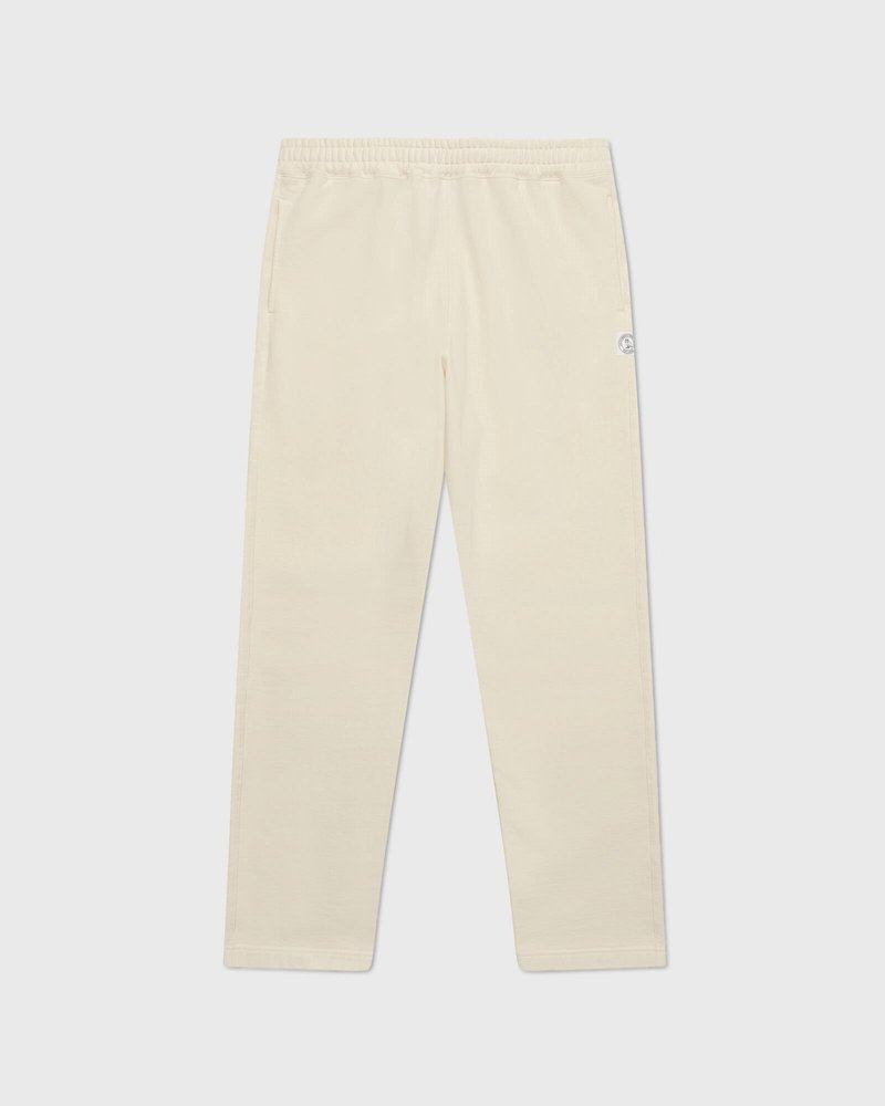 pantalon de survêtement crème ovo french terry à ourlet ouvert collection octobre