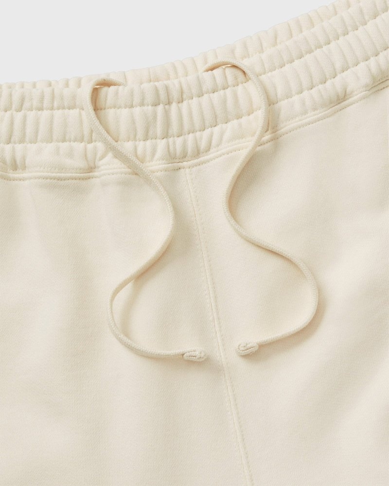 pantalon de survêtement crème ovo french terry à ourlet ouvert collection octobre