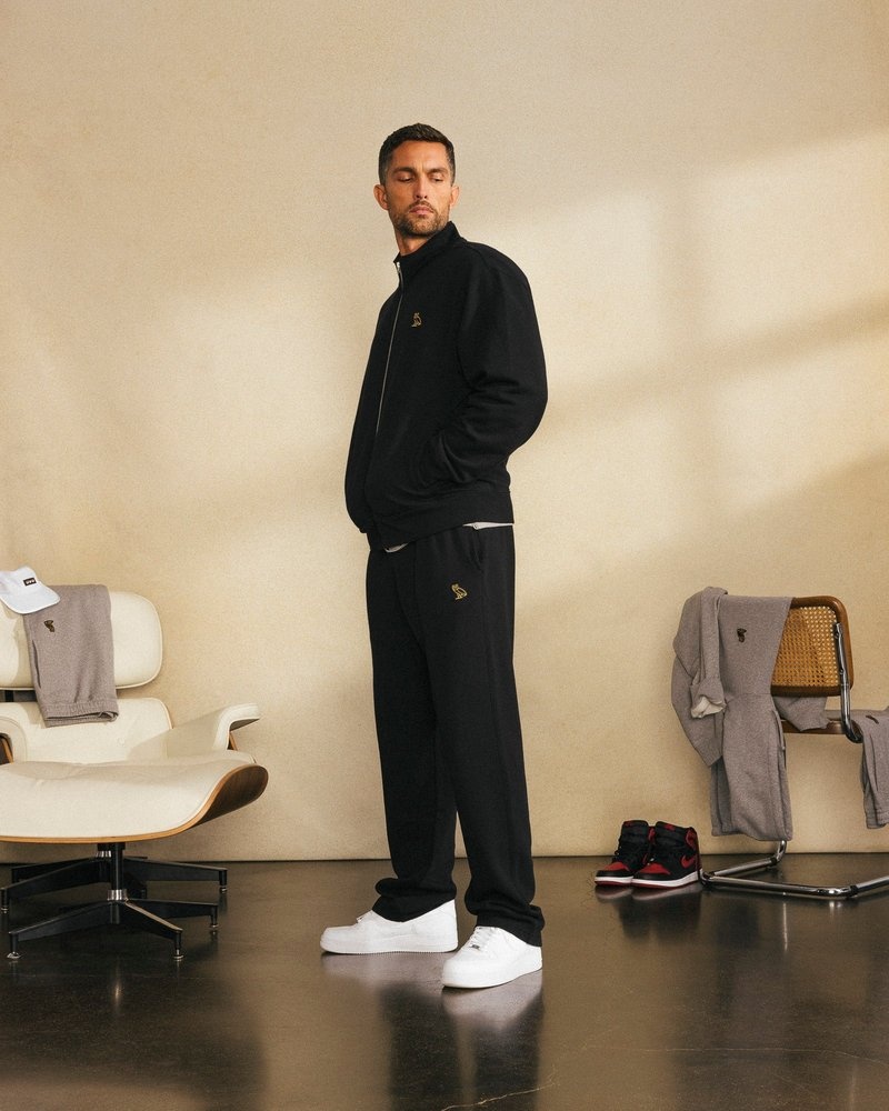 pantalon de survêtement noir ovo classic à ourlet ouvert collection octobre.
