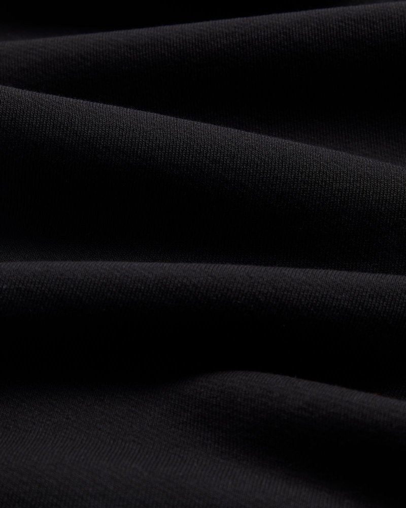 pantalon de survêtement noir ovo classic à ourlet ouvert collection octobre.
