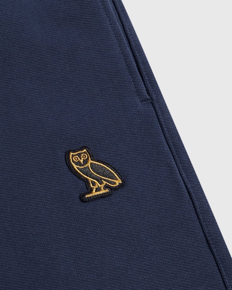pantalon de survêtement ovo classic à ourlet ouvert bleu marine collection octobre