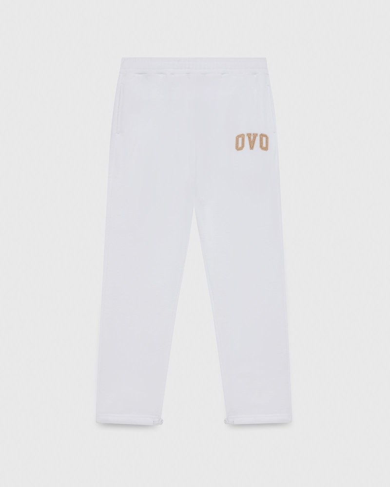 pantalon de survêtement blanc à ourlet ouvert et logo ovo arch collection octobre.