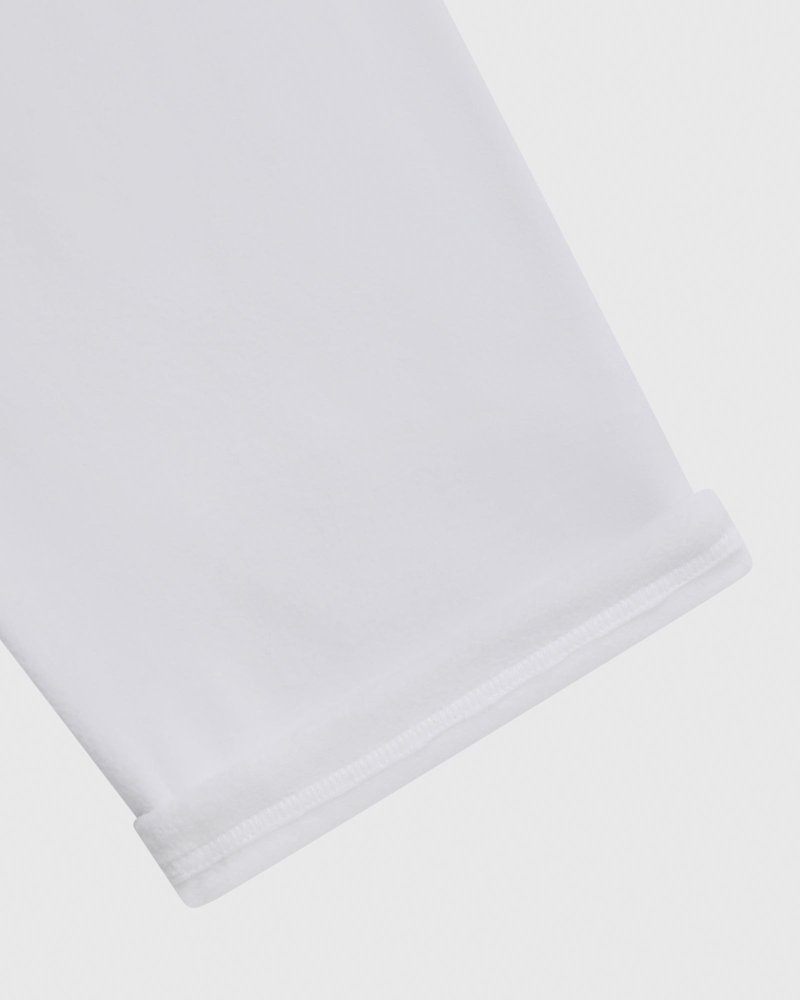 pantalon de survêtement blanc à ourlet ouvert et logo ovo arch collection octobre.