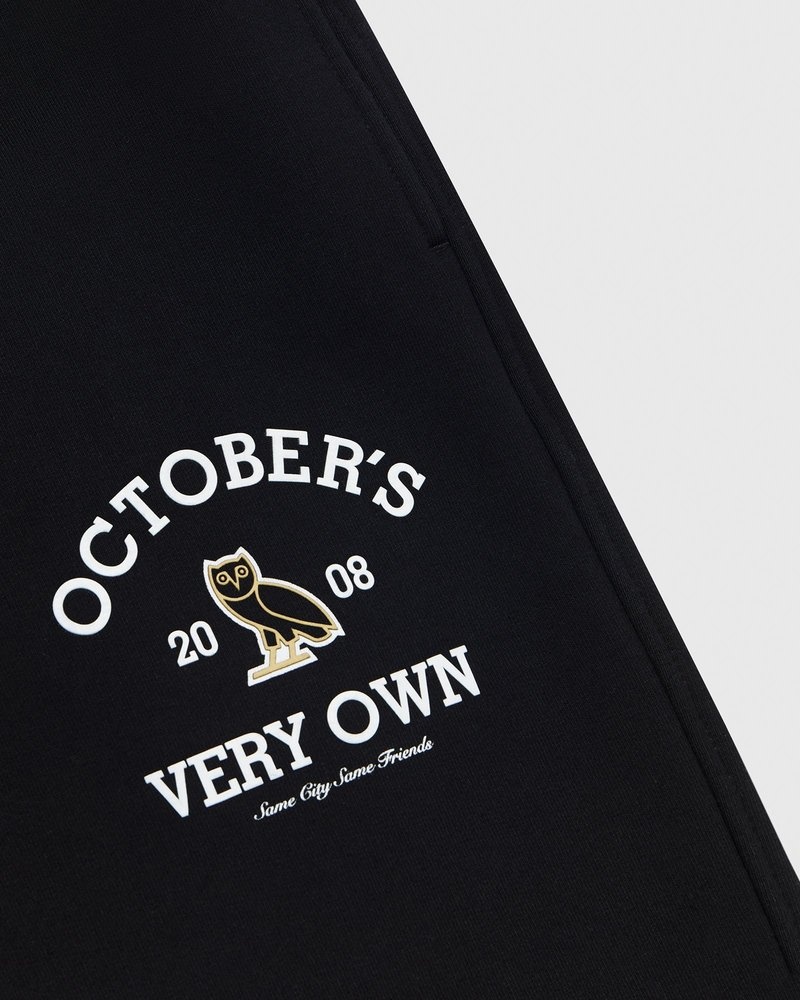 pantalon de survêtement noir à ourlet ouvert ovo collegiate collection octobre.