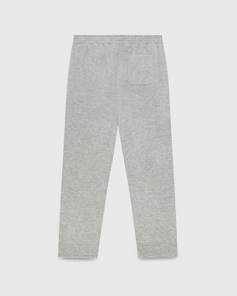 pantalon de survêtement gris à ourlet ouvert et logo ovo arch collection octobre.